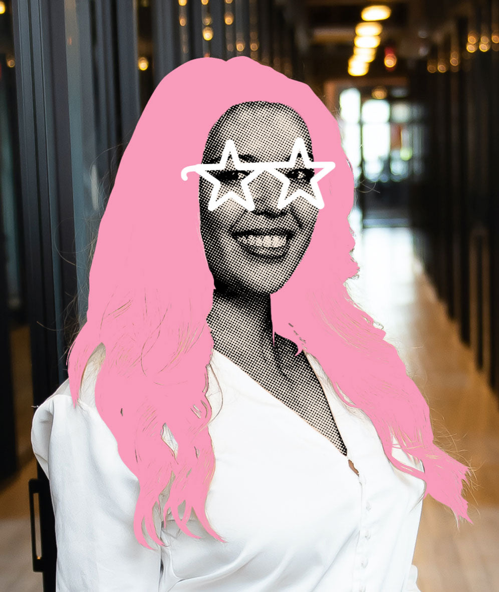 Mason Dixie founder Ayeshah Abeulhiga with pink hair, star glasses and a white shirt